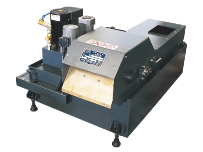 Magnetic roller chip conveyor, mounted on the coolant tank and suitable for ferrous, magnetizable chips